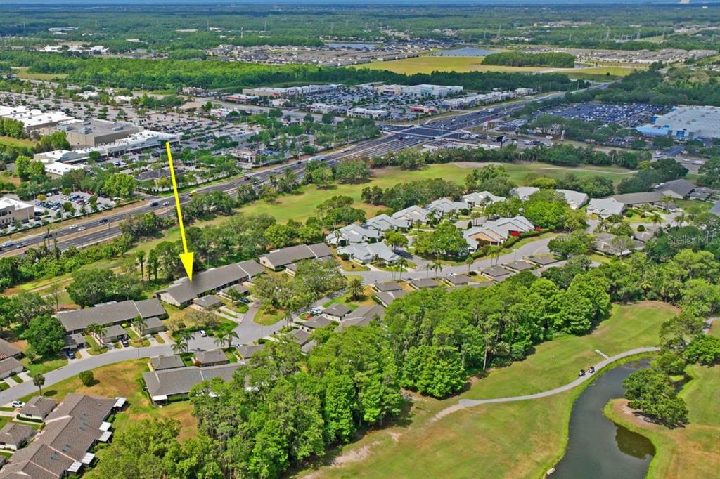 3274 Lori Lane, Unit 2 New Port Richey, FL 34655 - Photo 45 of 56 a view of a garden with an outdoor space