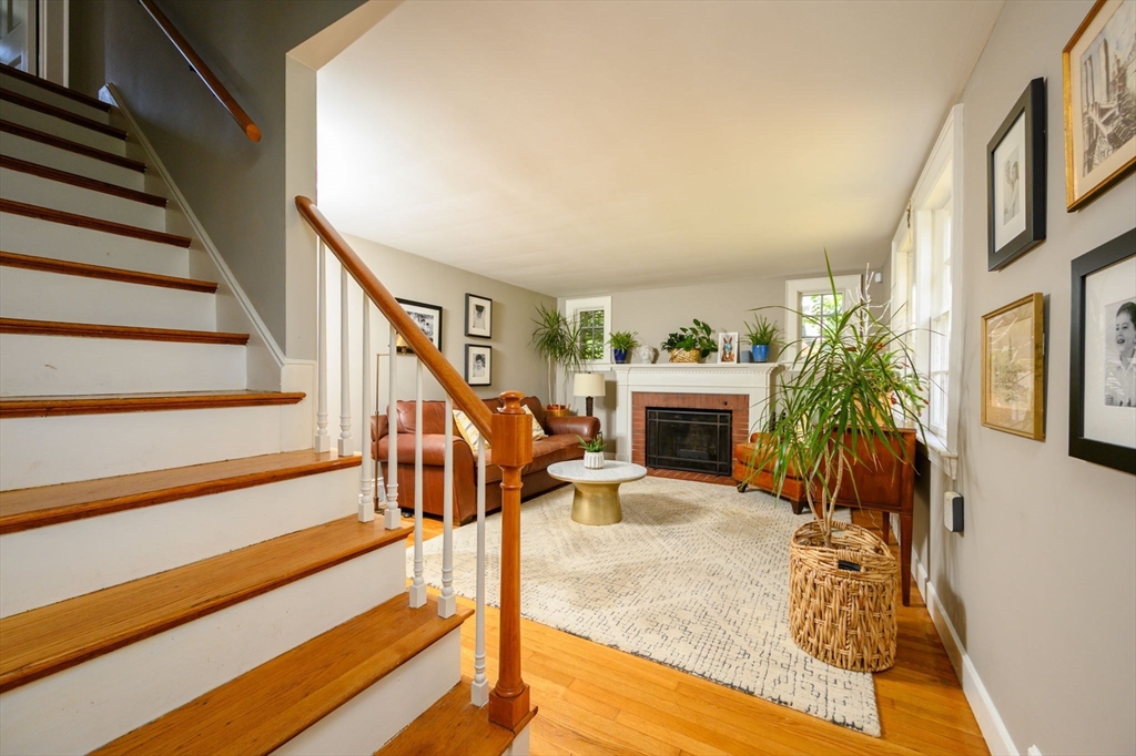 2 Hoover Road Hingham, MA 02043 - Photo 13 of 42 a view of entryway livingroom and hall with wooden floor