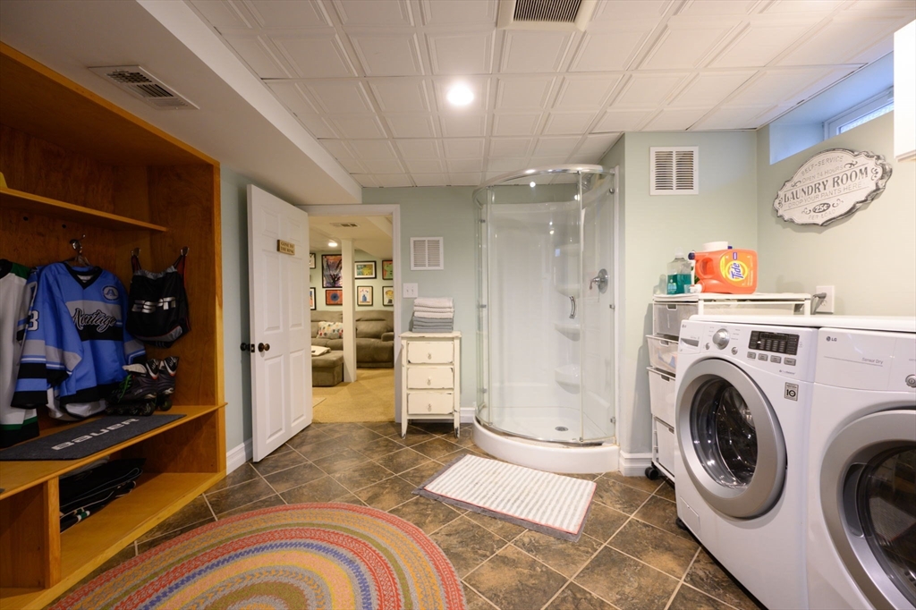 2 Hoover Road Hingham, MA 02043 - Photo 17 of 42 a spacious bedroom with a bed and a large mirror