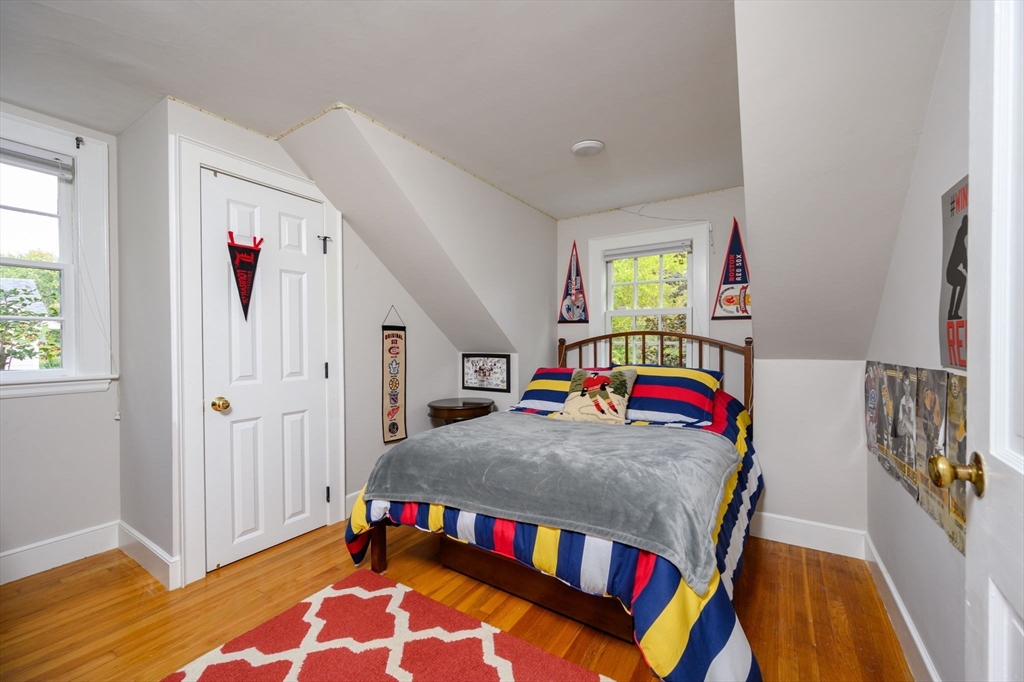 2 Hoover Road Hingham, MA 02043 - Photo 22 of 42 a living room with baby crib furniture and a baby crib