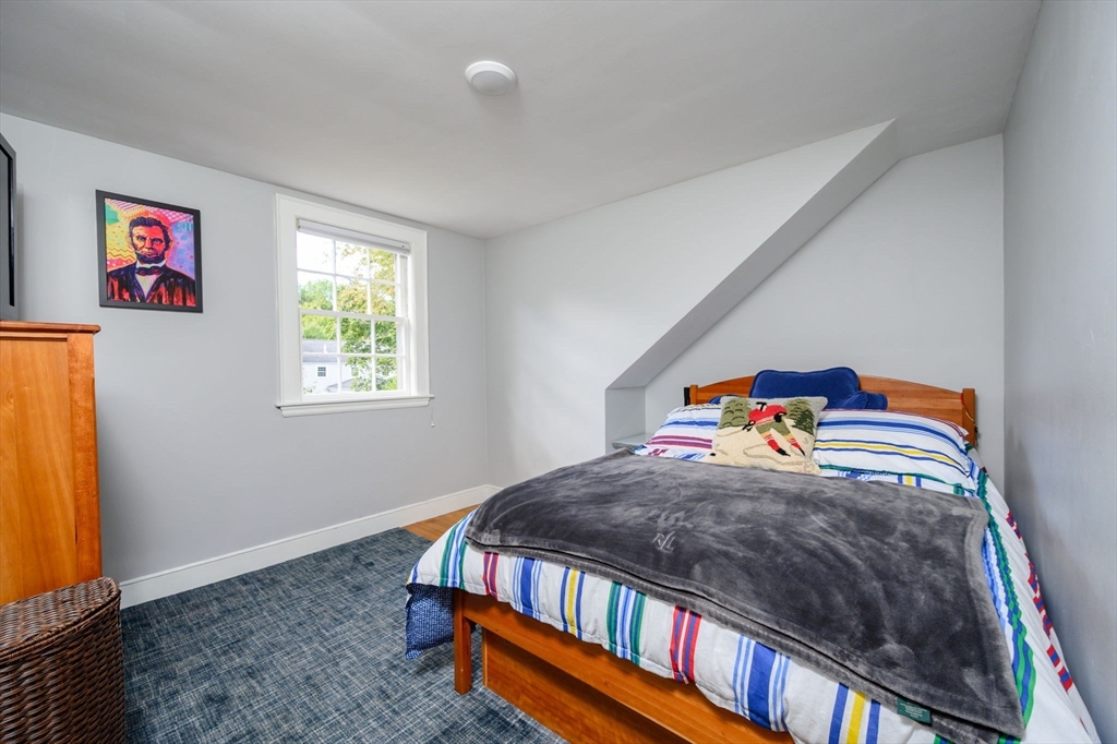 2 Hoover Road Hingham, MA 02043 - Photo 23 of 42 a bedroom with a bed and a window