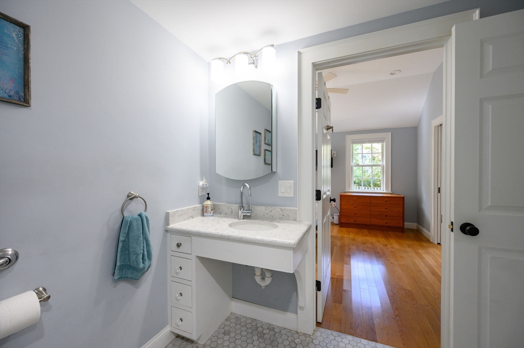 2 Hoover Road Hingham, MA 02043 - Photo 33 of 42 a en suite bathroom with a double vanity sink and a mirror