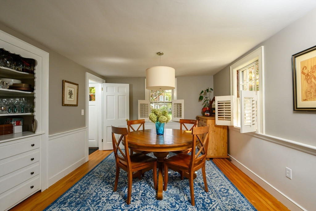 2 Hoover Road Hingham, MA 02043 - Photo 9 of 42 a dining room with furniture a rug and wooden floor