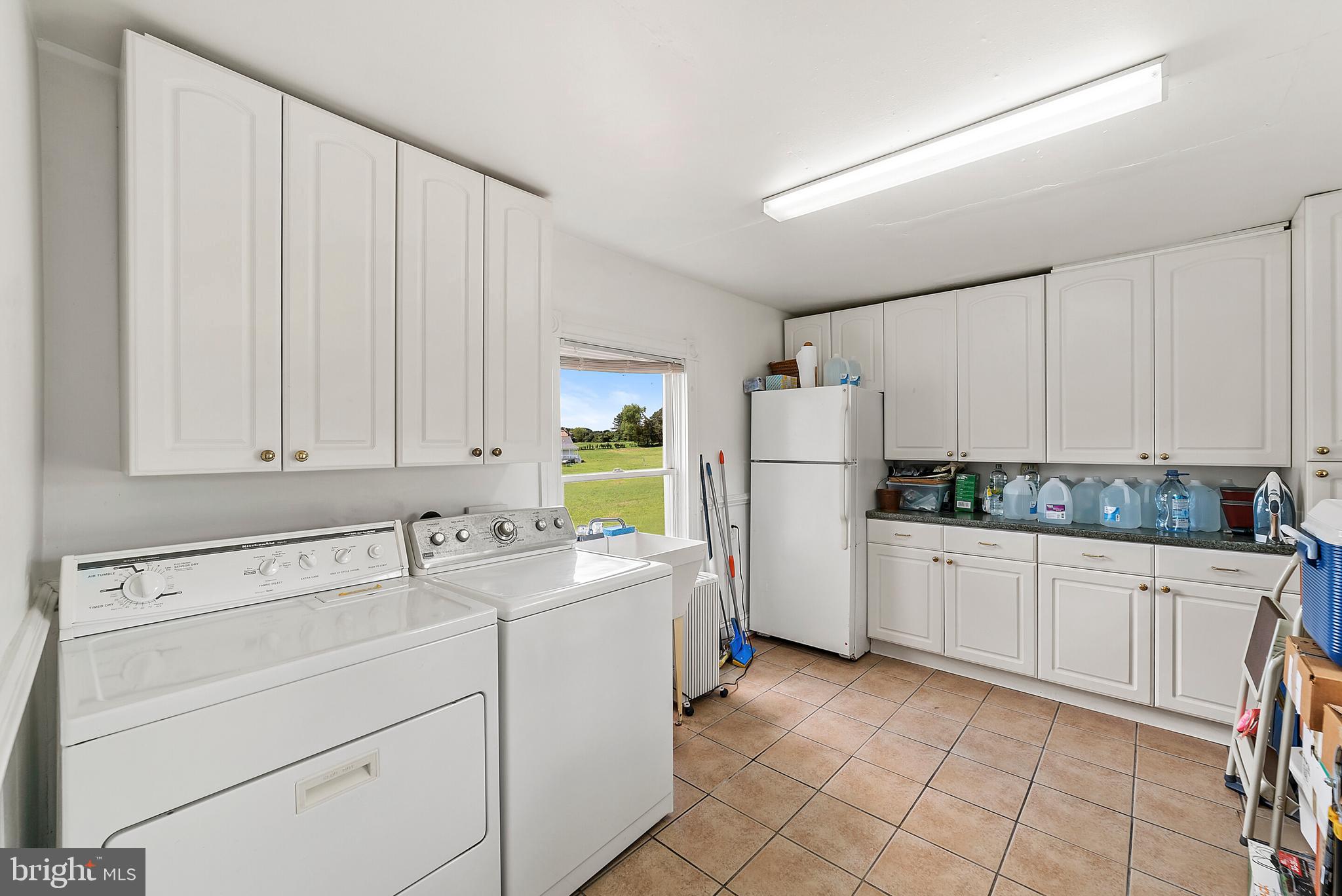7680 Opal Road Warrenton, VA 20186 - Photo 18 of 19 Huge laundry with built-in cabinets