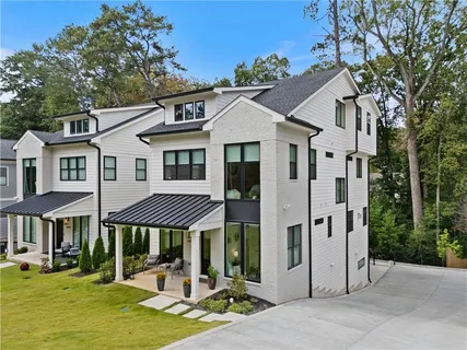 a view of swimming pool with seating space