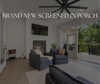 a bathroom with a granite countertop sink toilet and a mirror