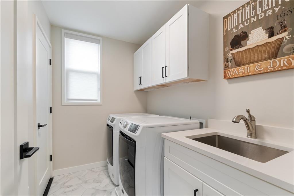 664 B Timm Valley Road Northeast Atlanta, GA 30305 - Photo 40 of 61 a view of a sink and dishwasher with cabinets