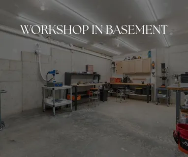 an aerial view of residential house with outdoor space and seating area