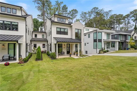 a picture of a bench in front of a building