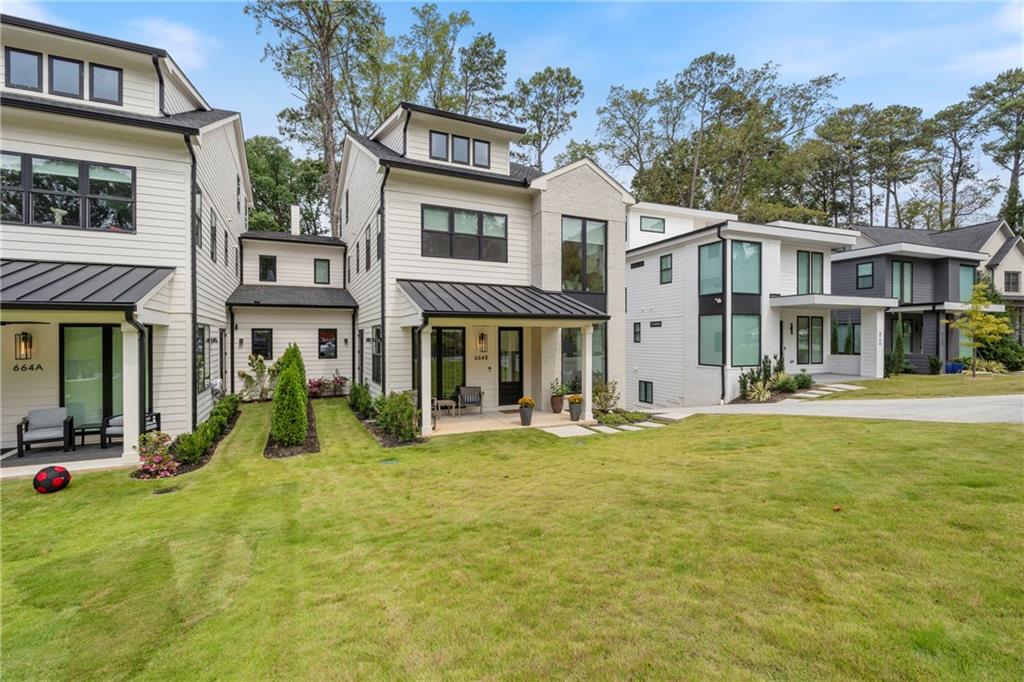 664 B Timm Valley Road Northeast Atlanta, GA 30305 - Photo 54 of 61 a view of a building with a swimming pool