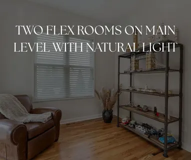 a view of a dining room with furniture wooden floor and chandelier