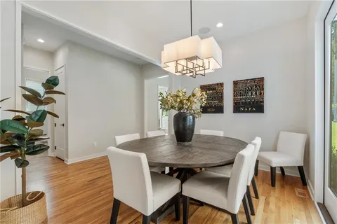 a living room with furniture fireplace and a flat screen tv