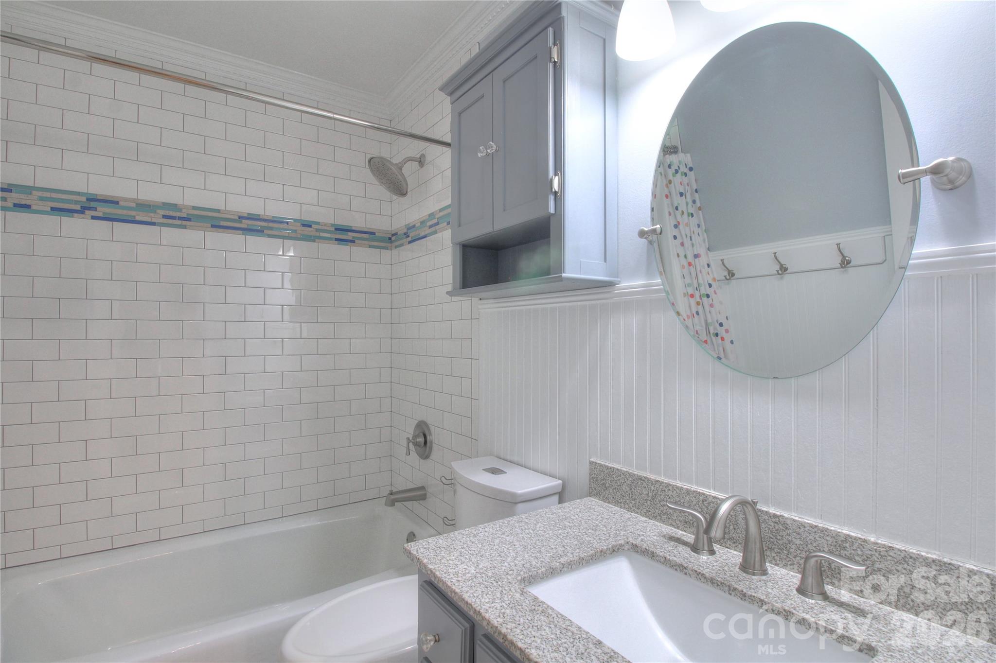 3408 Providence Manor Road Charlotte, NC 28270 - Photo 32 of 39 a bathroom with a sink toilet and shower