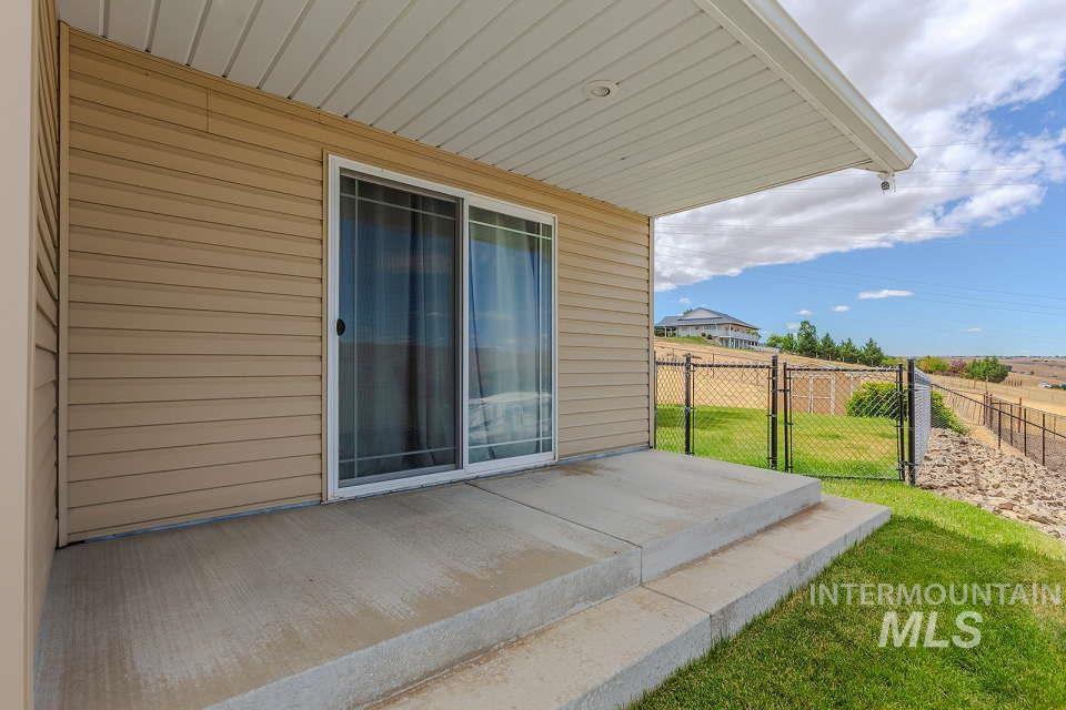 2924 27th Street Clarkston, WA 99403 - Photo 30 of 36 View of patio / terrace with a gate