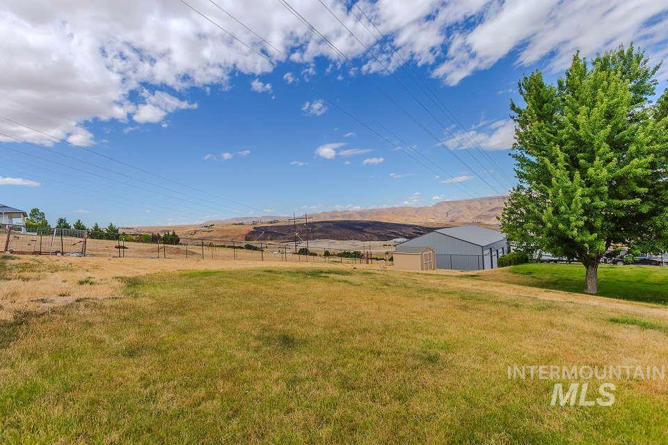 2924 27th Street Clarkston, WA 99403 - Photo 34 of 36 View of yard featuring a mountain view and a view of countryside