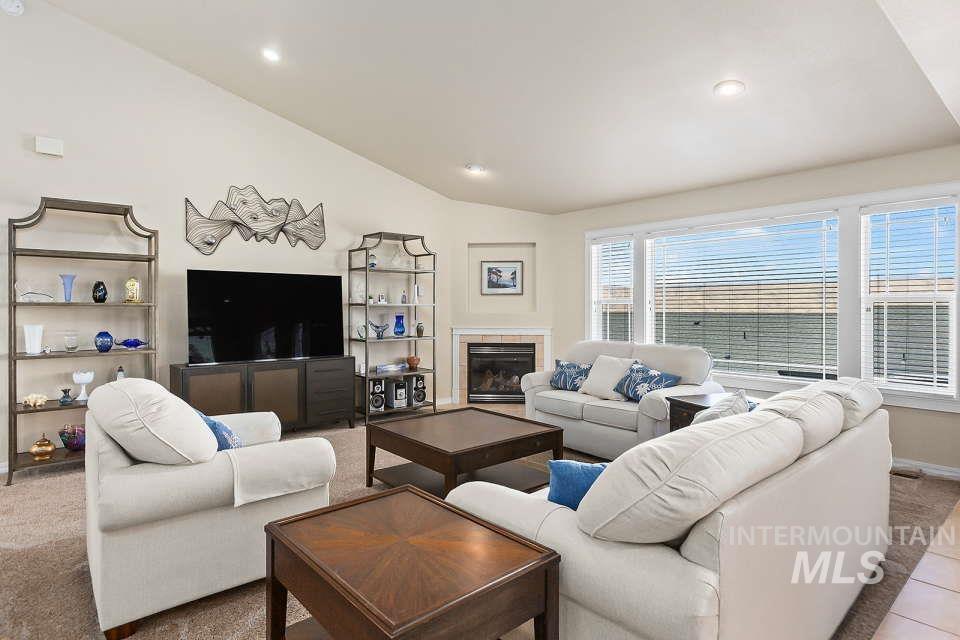 2924 27th Street Clarkston, WA 99403 - Photo 10 of 36 Living area with lofted ceiling, recessed lighting, and a fireplace