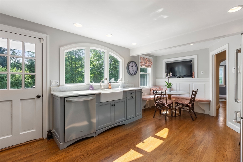 88 Albion Road Wellesley, MA 02481 - Photo 11 of 27 a kitchen with a table and chairs in it
