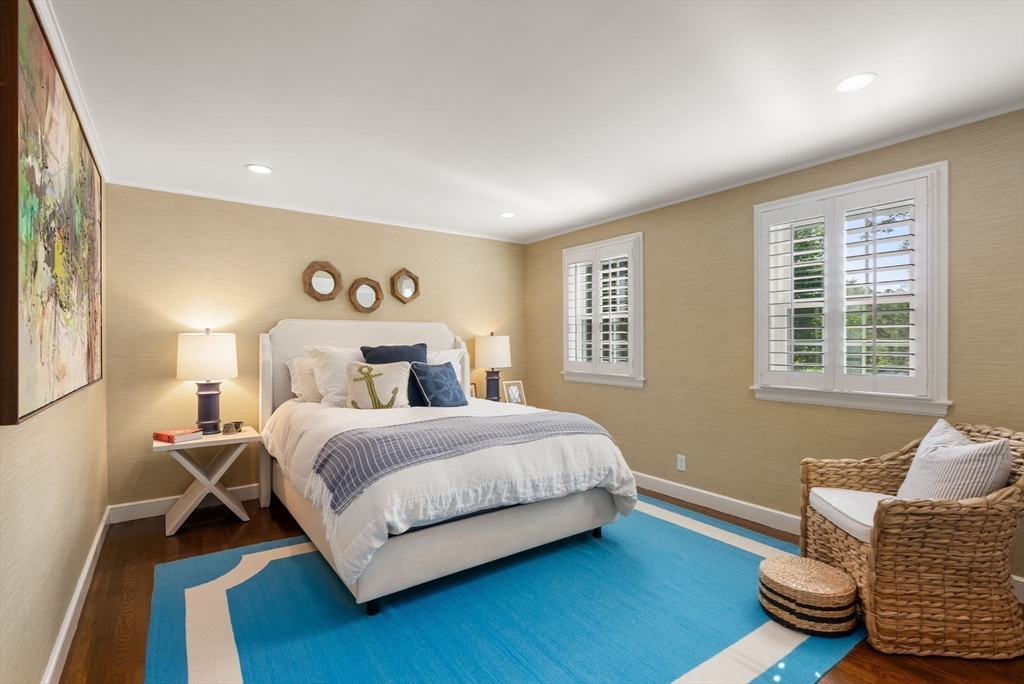 88 Albion Road Wellesley, MA 02481 - Photo 22 of 27 a bedroom with a bed and a couch