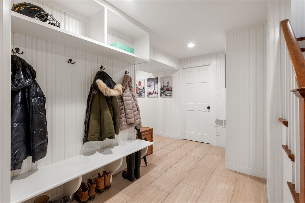 88 Albion Road Wellesley, MA 02481 - Photo 24 of 27 a view of walk in closet with clothes and shoes