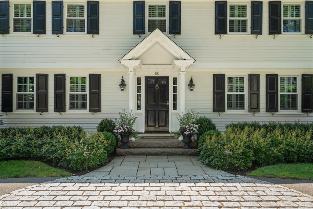 88 Albion Road Wellesley, MA 02481 - Photo 4 of 27 a front view of a house having yard