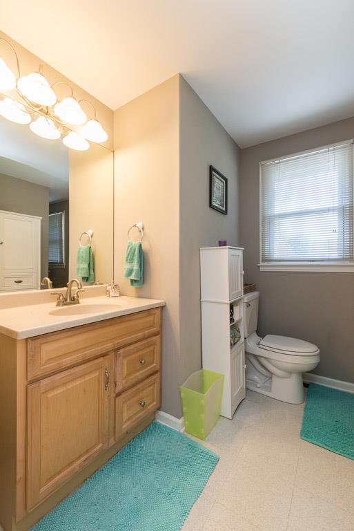 518 Rural Hill Road Nashville, TN 37217 - Photo 12 of 18 a bathroom with a granite countertop toilet sink and mirror