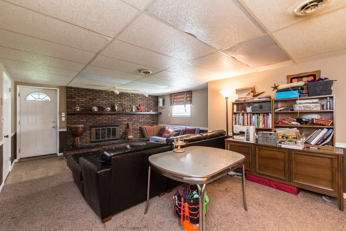 518 Rural Hill Road Nashville, TN 37217 - Photo 14 of 18 a room with furniture and a book shelf