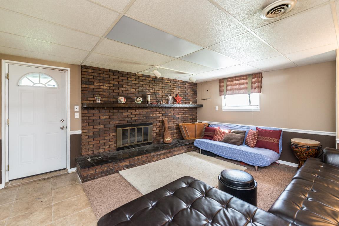 518 Rural Hill Road Nashville, TN 37217 - Photo 15 of 18 a living room with furniture and a fireplace