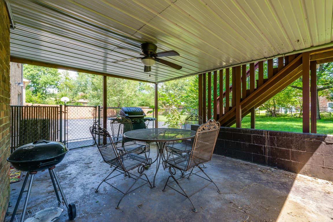 518 Rural Hill Road Nashville, TN 37217 - Photo 16 of 18 a view of a porch with furniture and a yard