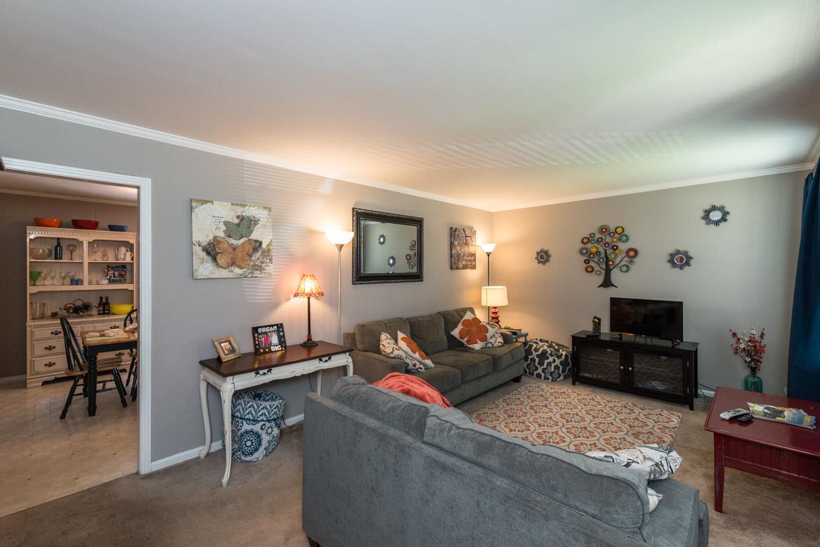 518 Rural Hill Road Nashville, TN 37217 - Photo 3 of 18 a living room with furniture and a flat screen tv