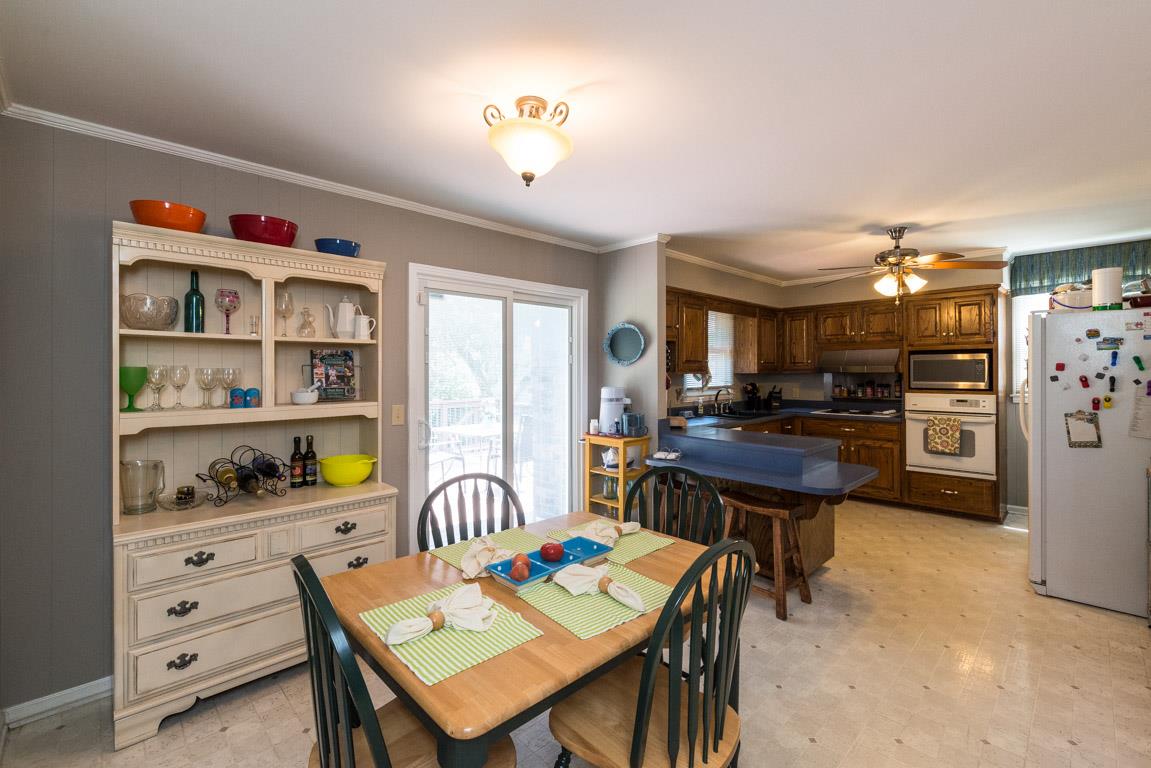 518 Rural Hill Road Nashville, TN 37217 - Photo 5 of 18 a view of a dining room with furniture and a kitchen