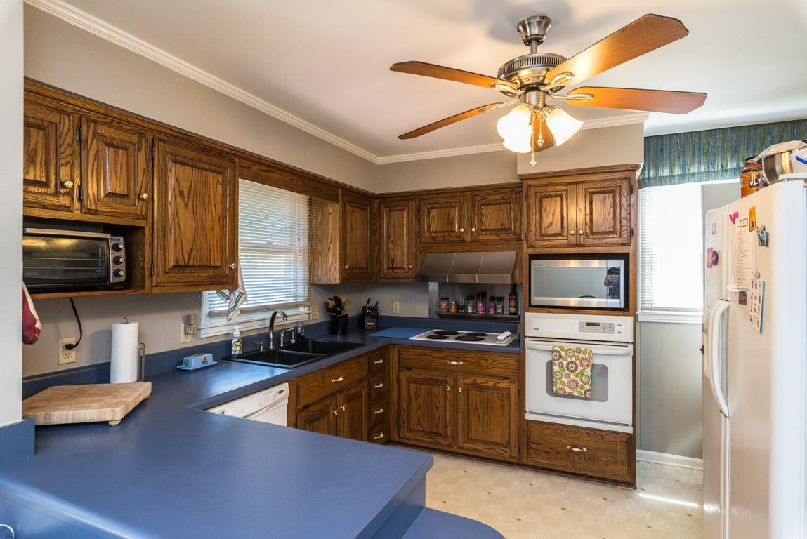 518 Rural Hill Road Nashville, TN 37217 - Photo 7 of 18 a kitchen with stainless steel appliances granite countertop a sink a stove and a refrigerator