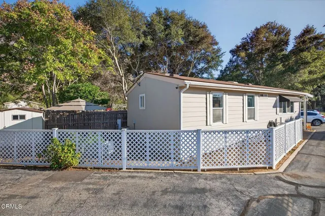 a house view with a backyard space