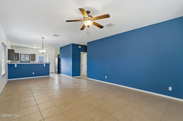 a view of kitchen and natural light