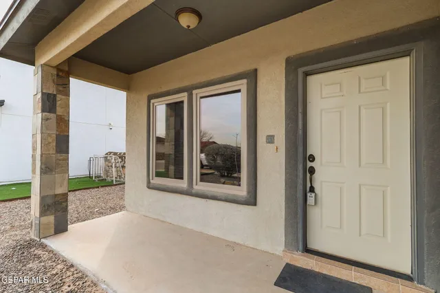a view of a brick house with front door