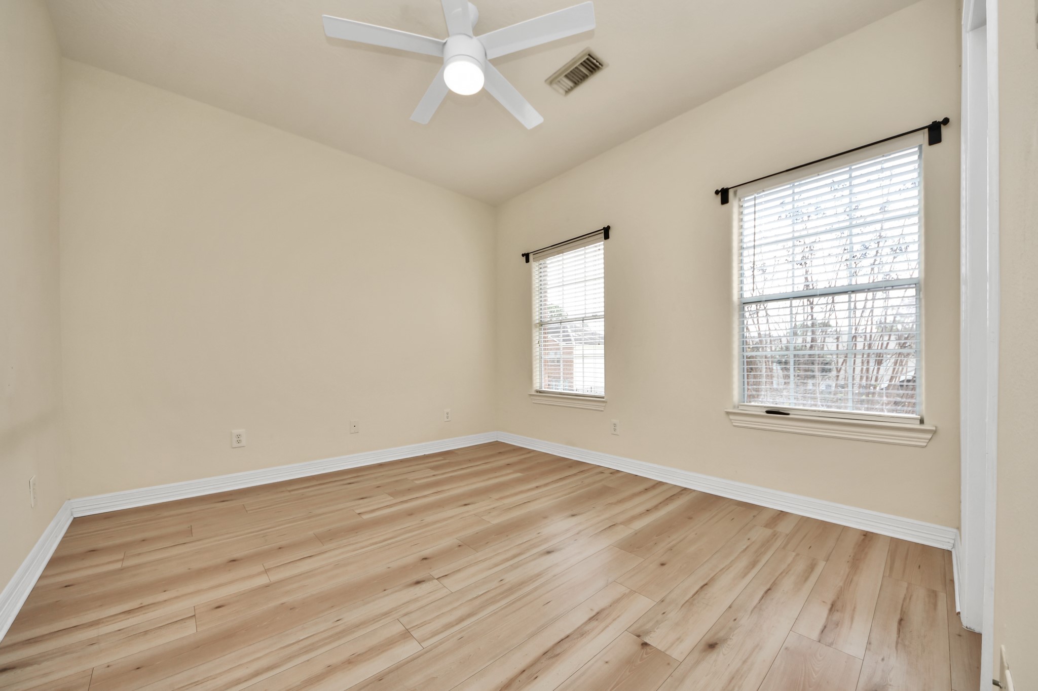 13038 Gentryside Court Houston, TX 77077 - Photo 12 of 20 Spacious secondary bedroom with large windows and its own en suite bathroom
