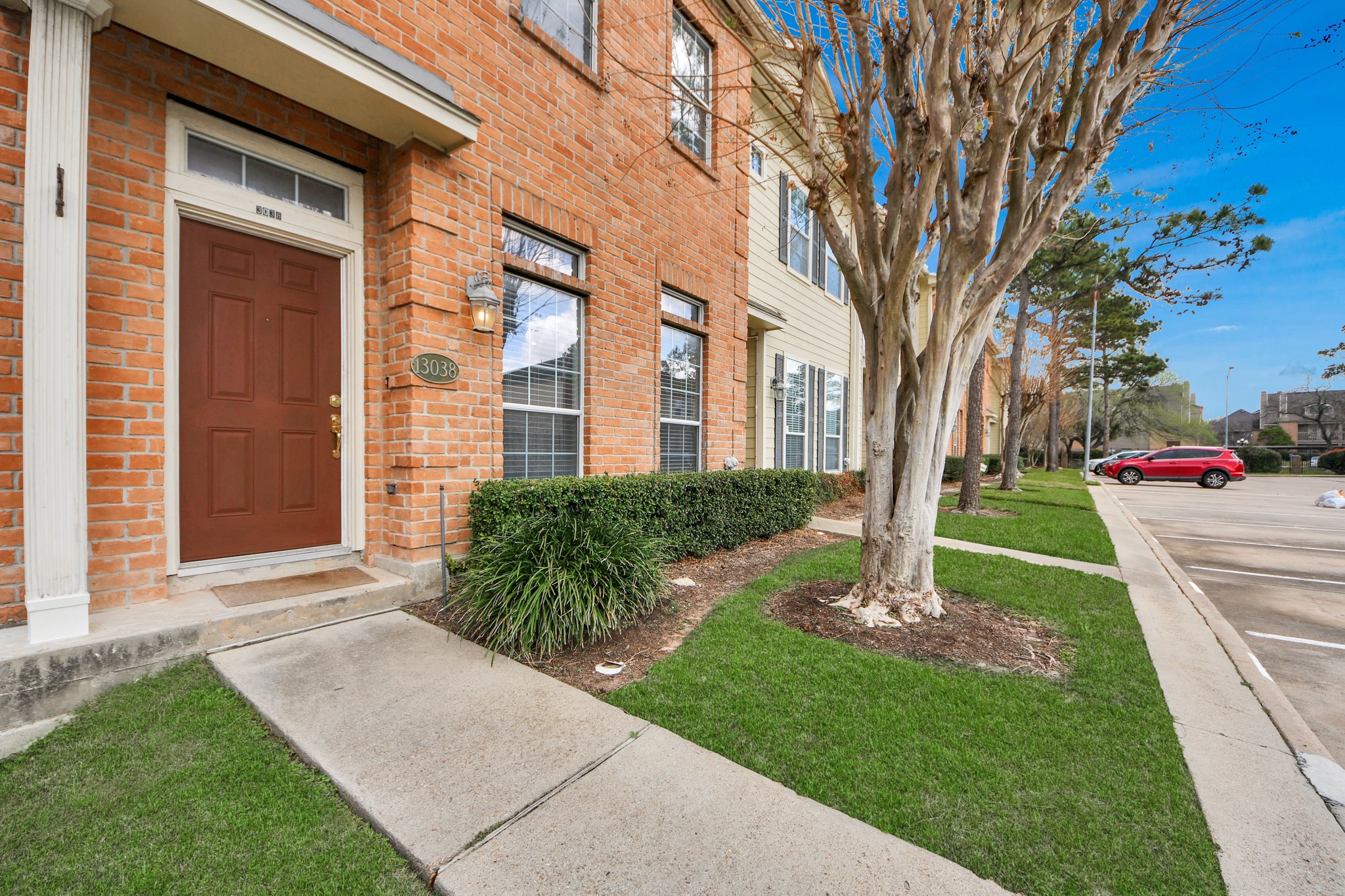 13038 Gentryside Court Houston, TX 77077 - Photo 2 of 20 Beautiful front façade set within a well-kept community with a modest neighborhood fee.