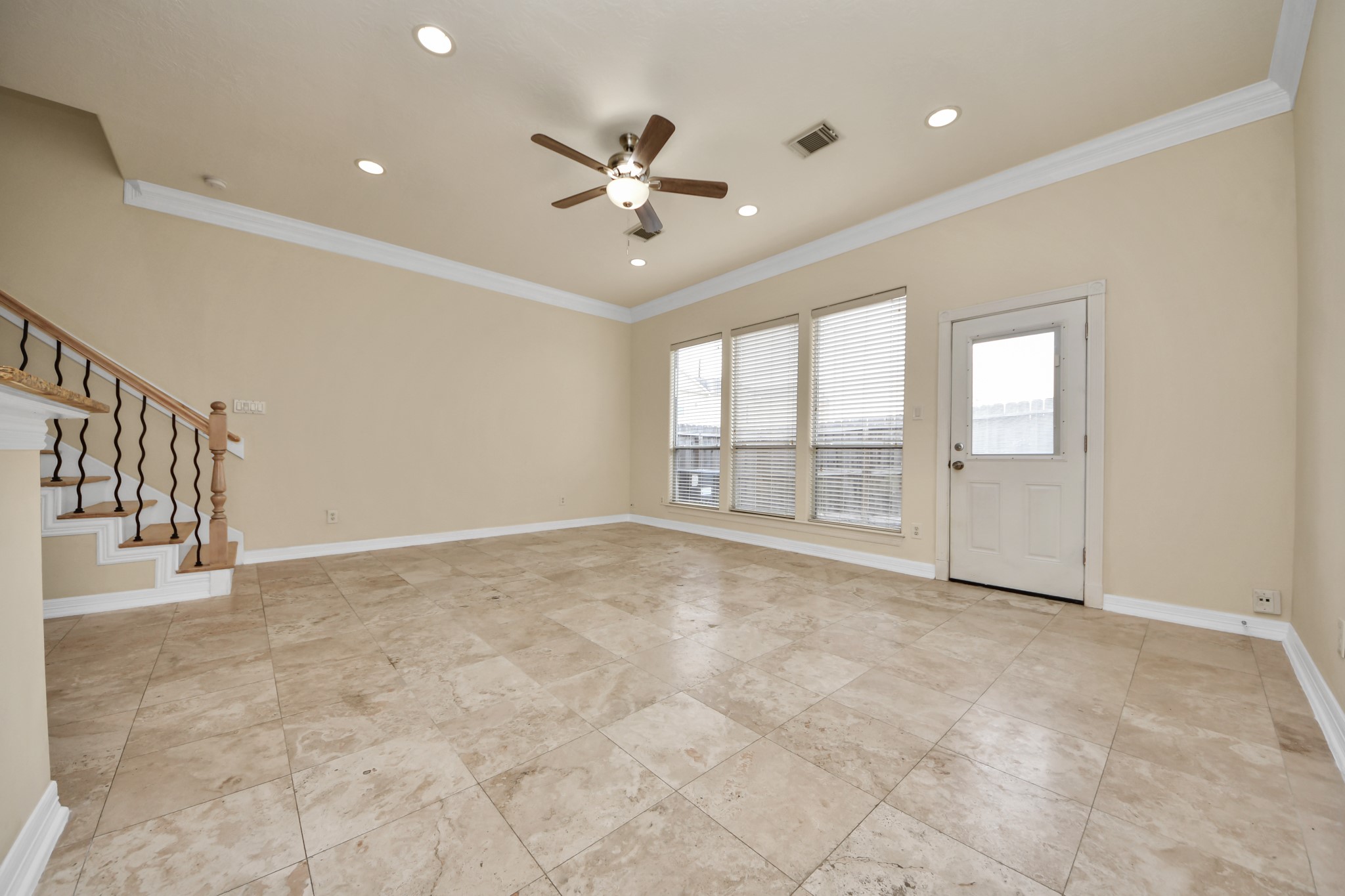 13038 Gentryside Court Houston, TX 77077 - Photo 9 of 20 Spacious living room with staircase