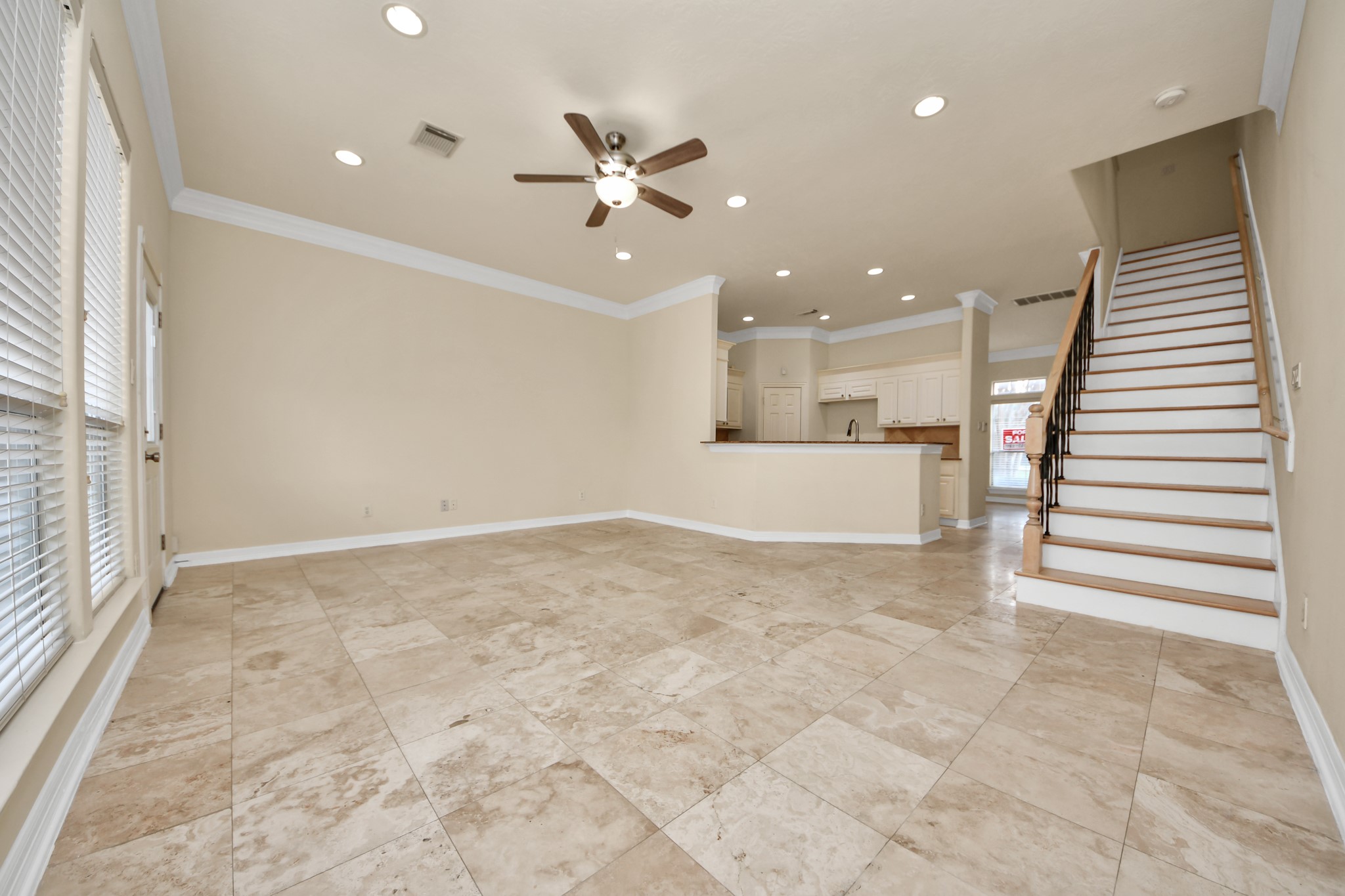 13038 Gentryside Court Houston, TX 77077 - Photo 10 of 20 Another view of living room, and stairs recently redone with upgraded wood laminate