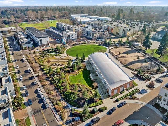 an aerial view of a city with lots of residential buildings