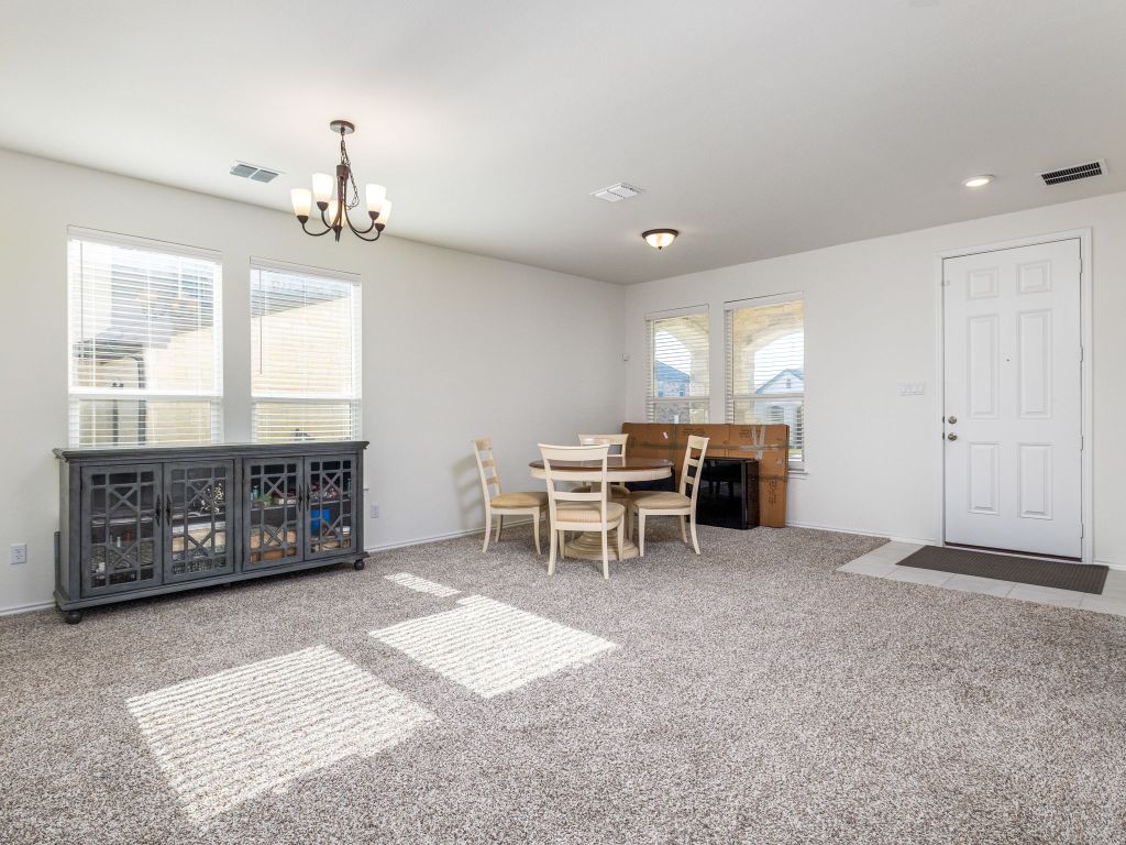 3921 Riardo Drive Round Rock, TX 78665 - Photo 13 of 27 a view of a room with furniture and window