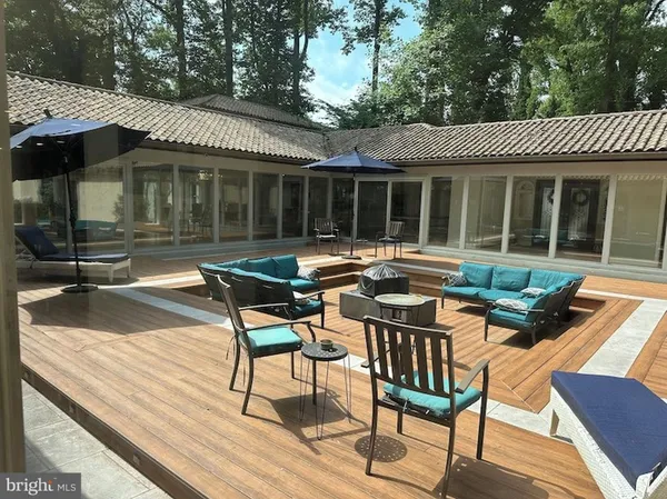 a view of a house with sitting area and furniture