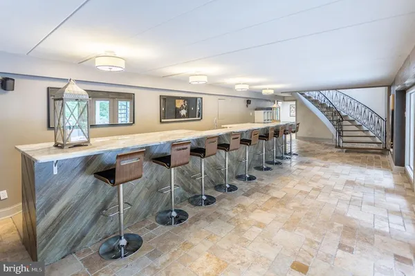 a view of a hallway with seating area