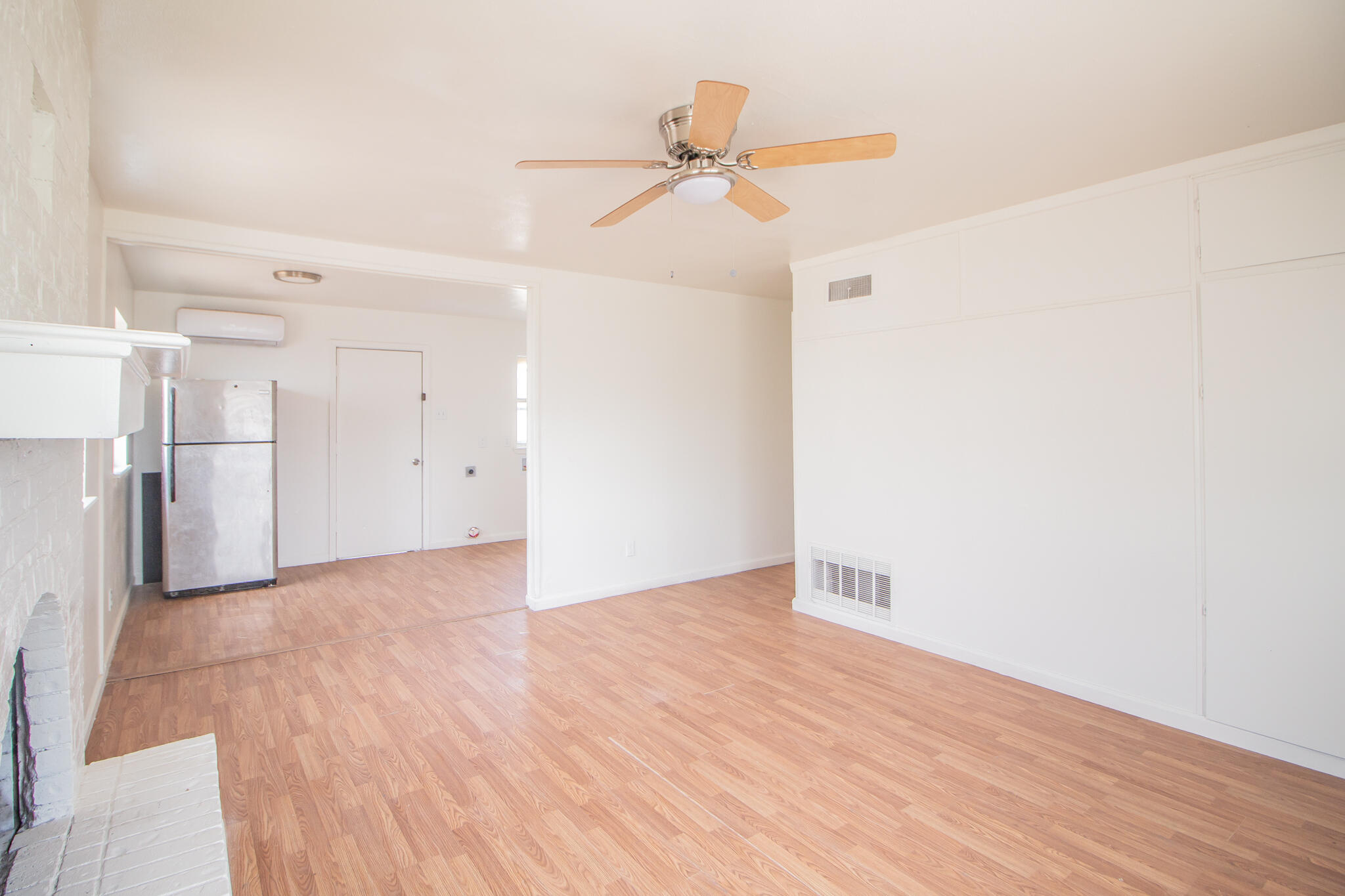 3304 Itasca Street Lubbock, TX 79415 - Photo 4 of 18 a view of empty room with wooden floor