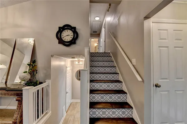 a view of entryway with wooden floor