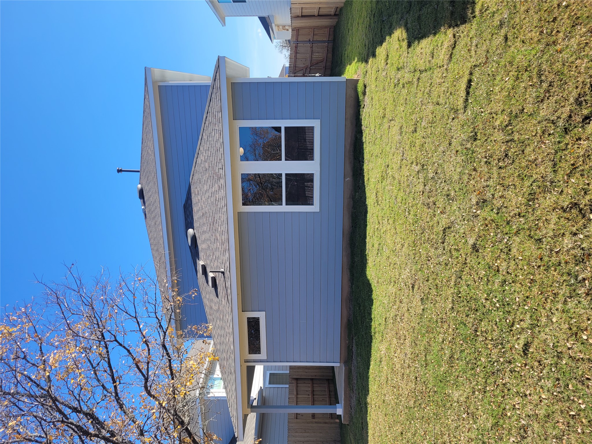 120 Free Stone Drive Georgetown, TX 78628 - Photo 23 of 40 A fenced backyard offers privacy and space for outdoor activities, complemented by a covered patio area.