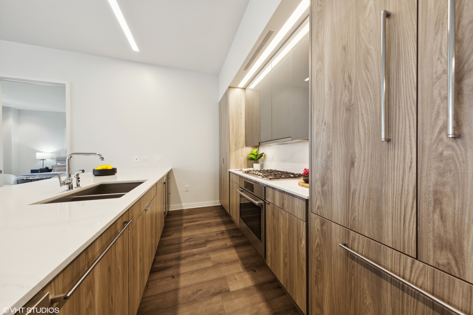 61 East Banks Street, Unit 802 Chicago, IL 60610 - Photo 9 of 23 a kitchen with stainless steel appliances a sink and stove