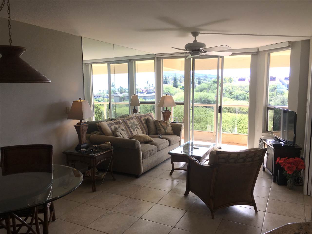 2575 South Kihei Road, Unit Q401/401A Kihei, HI 96753 - Photo 7 of 25 a living room with furniture and large windows