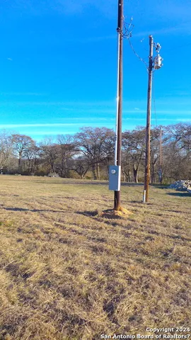 a view of a yard with an ocean