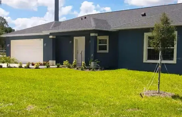 a house view with a garden space