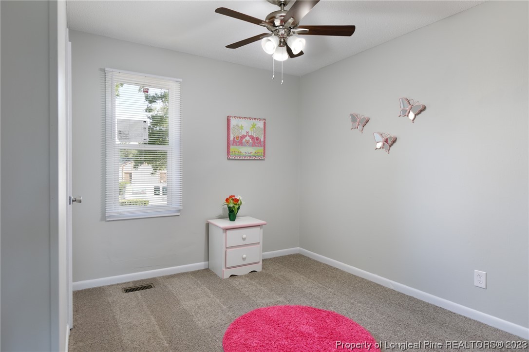 4514 Ruby Road Fayetteville, NC 28311 - Photo 16 of 21 a view of room with hardwood floor and cabinet
